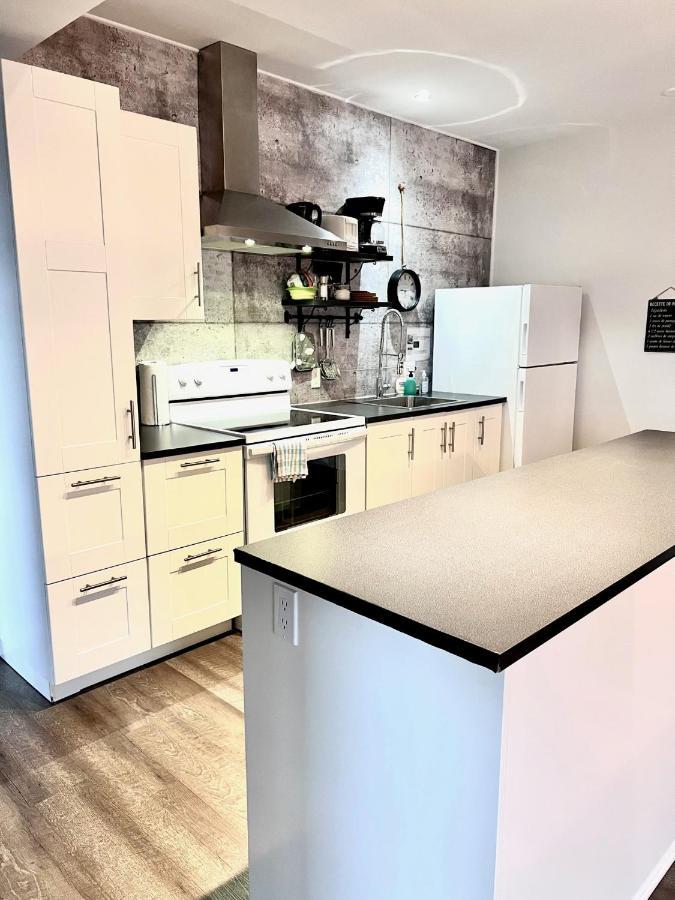 Sutton - Condo Au Coeur Du Village Kültér fotó